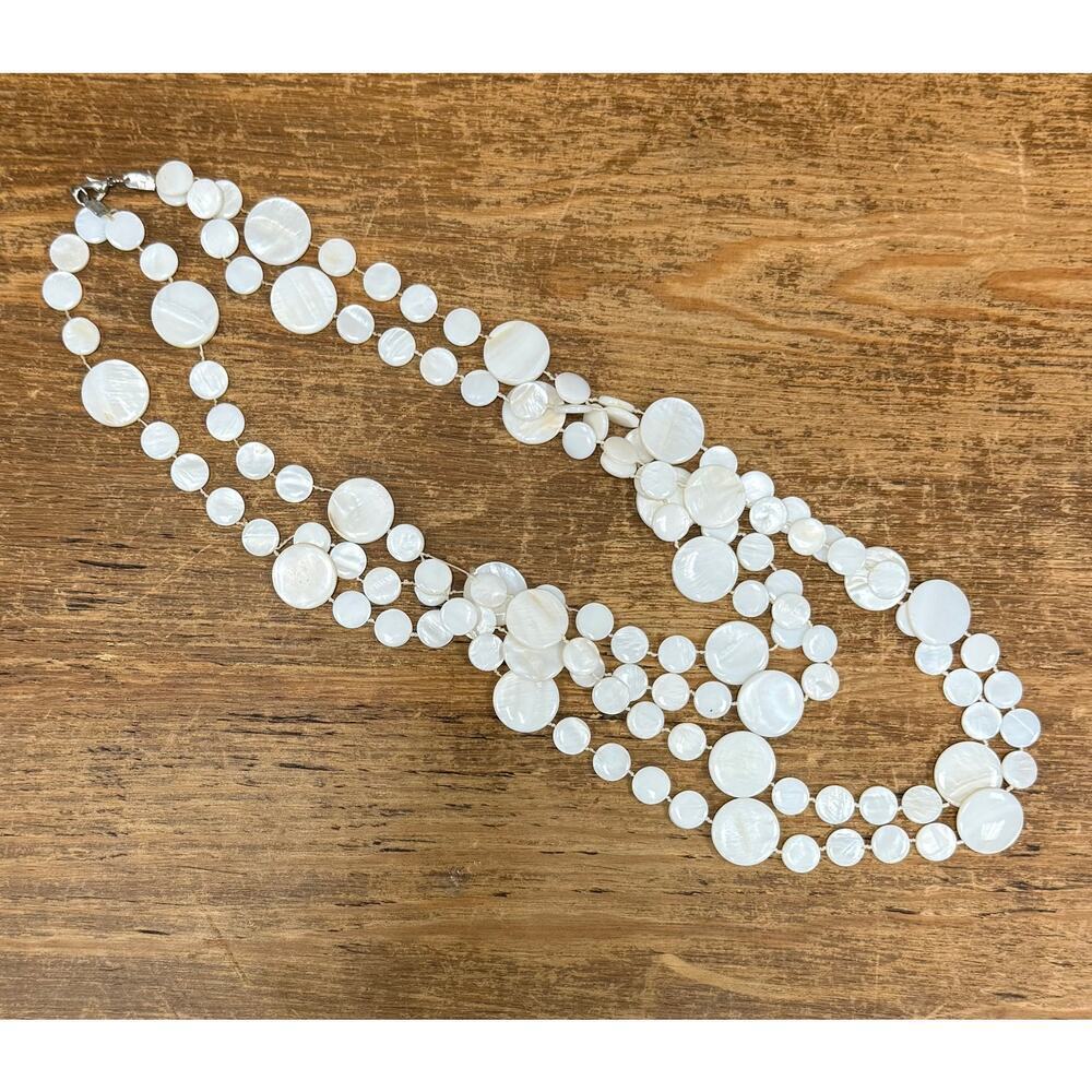 Beautiful 4 Strand White Shell Necklace. WA462
